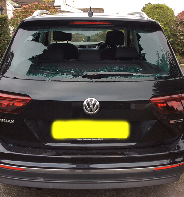 rear of car with smashed window